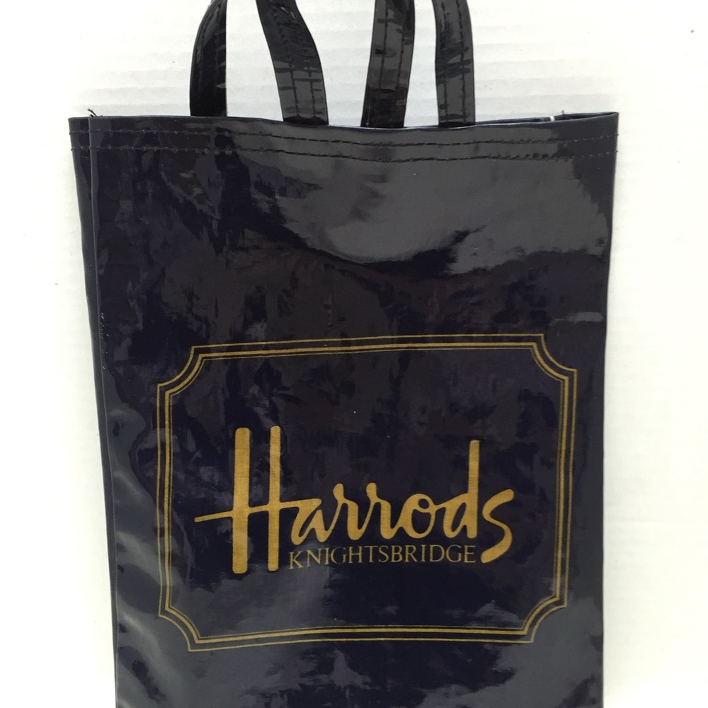 HARROD’S of London black shopping bag.